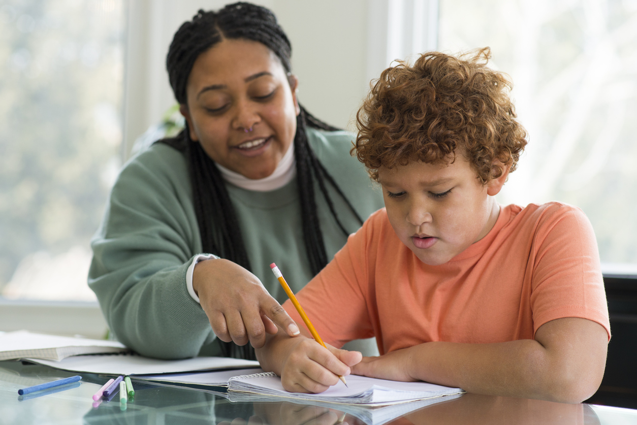 A student receives individualized help at school 