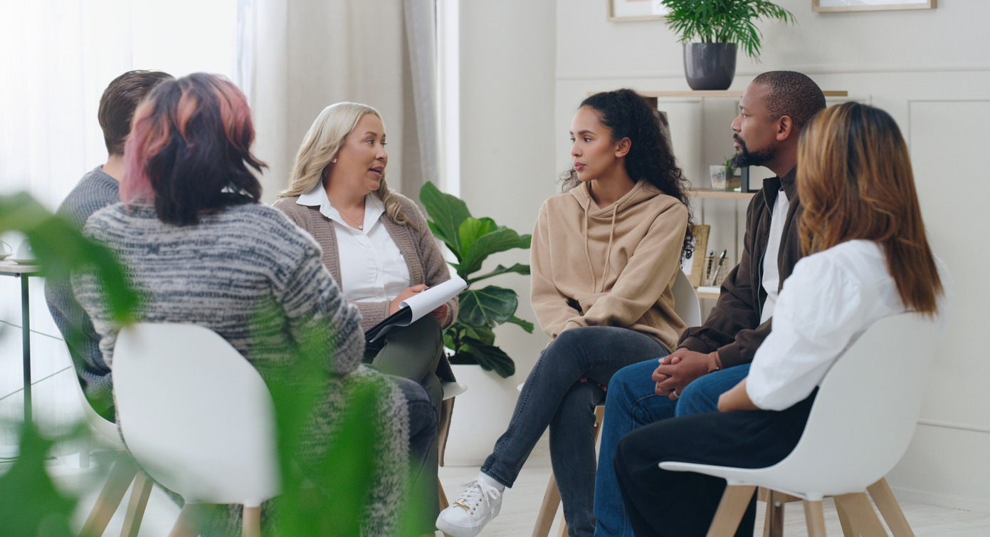 People attend a support group