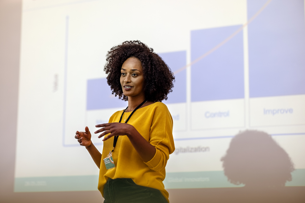 A woman delivers a diabetes conference presentation