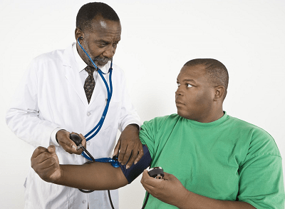 Doctor Checking Blood Pressure