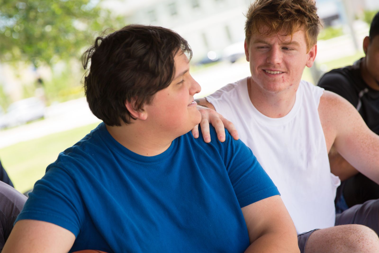 Two young people engage in an open dialogue about stigma