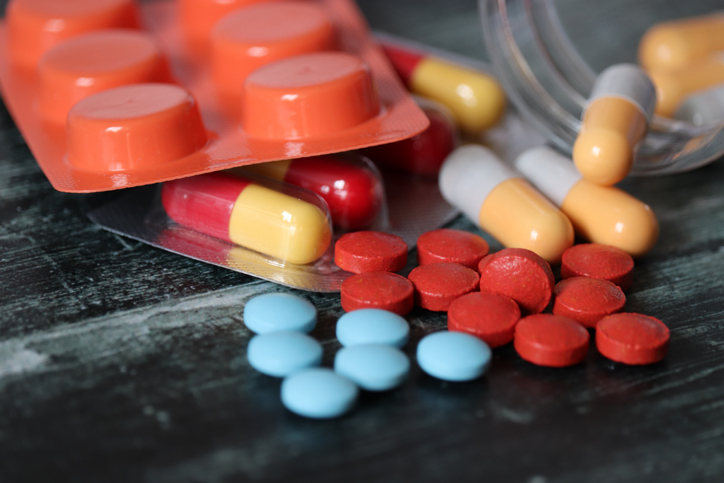 a variety of pills placed together on a table