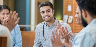 People participate in a clinical trial on diabetes education