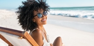 woman smiling on the beach