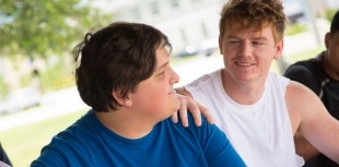 Two young people having an open dialogue about stigma