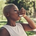 Woman using inhaler