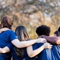 support group huddles together